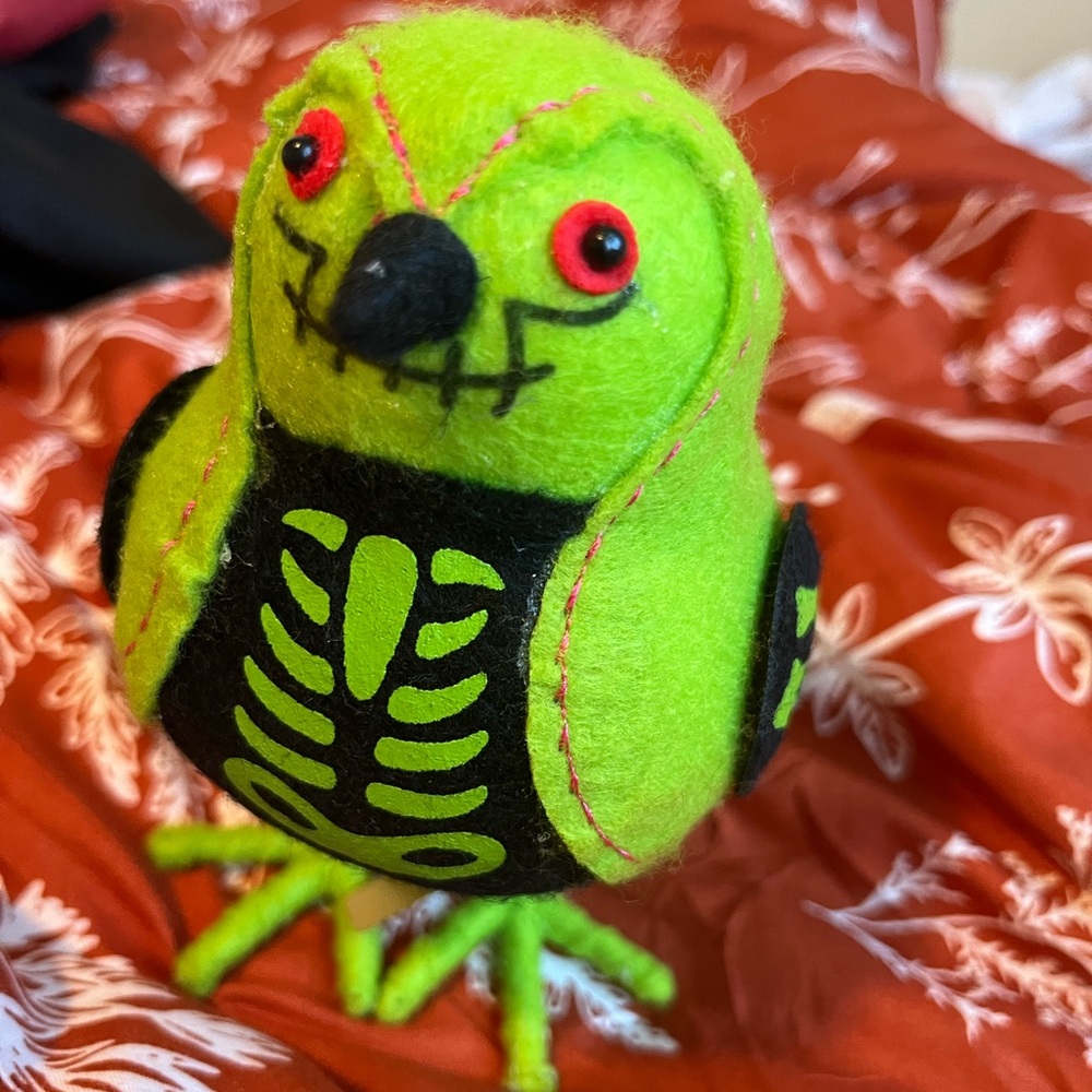 Green and Black Plush Bird Toy